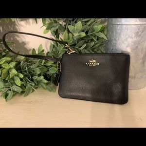 Coach small black pebbled leather wristlet